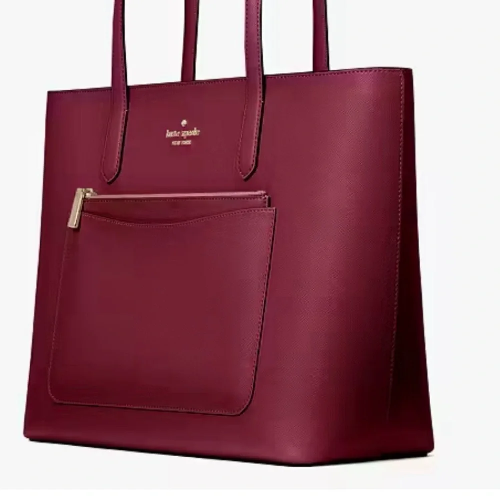 Kate Spade 3 piece set with tote wristlet and pouch